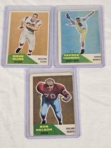 lot 319 image: Lot of 3 Vintage Football Cards Featuring George Herring, Doug Cline, and Bob Nelson - Denver Broncos, Houston Oilers, and Oakland Raiders Football Cards