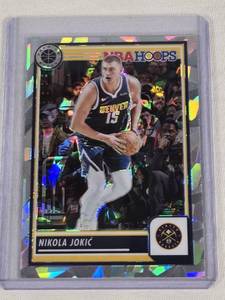 lot 341 image: Nikola Jokic 2023-24 Panini NBA Hoops Cracked Ice Prizm #1 - Denver Nuggets Basketball Card