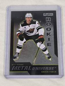 lot 358 image: Brock Faber Rookie 2023-24 Skybox Metal Universe Insert #R-21 - Minnesota Wild Hockey Card