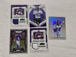 lot 386 image: Lot of 5 Minnesota Vikings Rookies, Relics and Numbered Football Cards Featuring Ihmir Smith-Marsette, Andrew Booth Jr., Jordan Addison, and Cris Carterpecial Features like Relics and Numbered Cards.