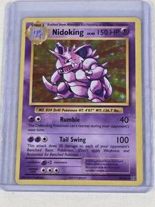lot 393 image: Nidoking 2016 Pok�mon Holo #45108 - Pok�mon Trading Card