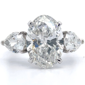 lot 1 image: 7.50 Carat Diamond Oval & Pear Three-Stone Ring in 14k Gold w Report VIDEO