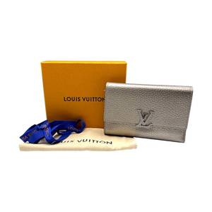 lot 27D image: Louis Vuitton Capucines Taurillon Leather Wallet  Metallic Silver  Box Pre-Owned Retail $1,250