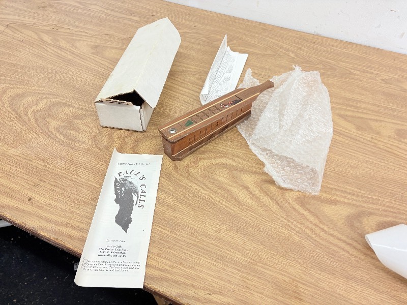 lot 250 image: New in box turkey call