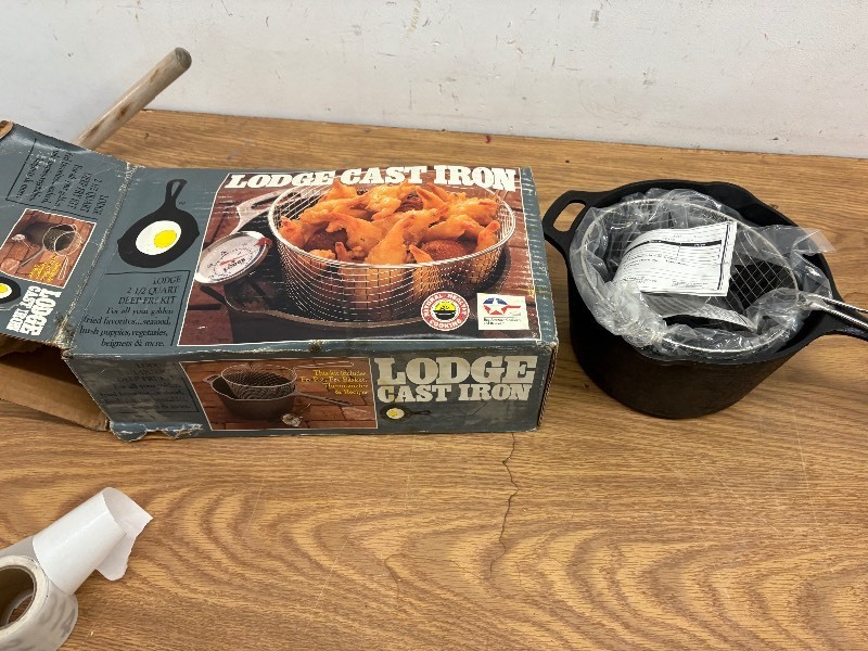 lot 311 image: Lodge cast iron deep fryer with basket- new in box
