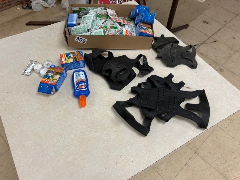 lot 399 image: Pairs of Boot traction covers and off mosquito wipes and