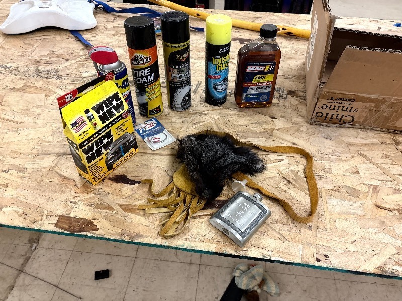 lot 409 image: Assorted contents with flask and skin carrier