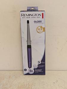 lot 79 image: NEW REMINGTON GLOSS TAPERED CURLING IRON