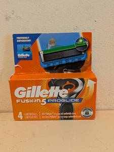 lot 116 image: NEW GILLETTE FUSION 5 PROGLIDE REPLACEMENT CARTRIDGES 4PK