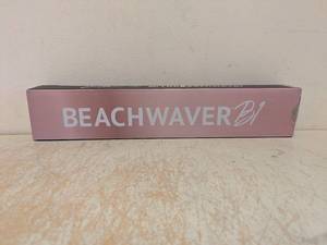 lot 185 image: BEACHWAVER B1 ROTATING CURLING IRON