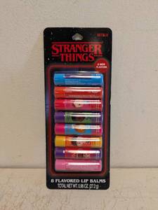 lot 95 image: NEW STRANGER THINGS FLAVORED LIP BALM 8PK