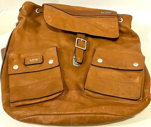 lot 142 image: Tumi Backpack Brown Leather - Front Pockets & APW Patch