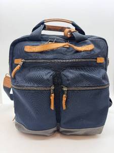 lot 135 image: TUMI Navy Nylon Backpack with Tan Leather Trim & Front Zip Pockets