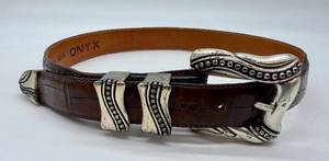 lot 266 image: Onyx Crocodile-Embossed Leather Belt - Size 28, Ornate Silver Buckle