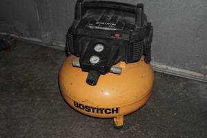 lot 64 image: Bostitch 6 Gallon Pancake Air Compressor