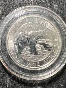 lot 15 image: 2018 CANADIAN POLAR BEAR HALF TROY OZ .9999 FINE SILVER IN AIRTITE