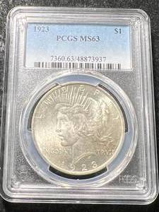 lot 17 image: 1923 US PEACE SILVER DOLLAR PCGS MS63