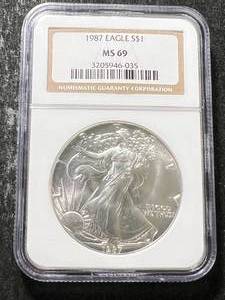 lot 22 image: 1987 AMERICAN SILVER EAGLE NGC MS69
