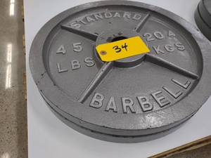 lot 34 image: (2) 45 lb. Weights...