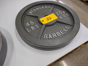 lot 35 image: (2) 45 lb. Weights...