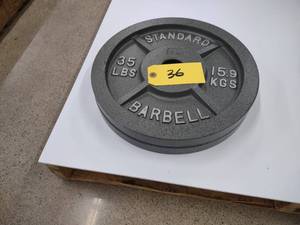 lot 36 image: (2) 35 lb. Weights...