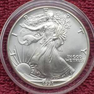 lot 12 image: 1991 American Silver Eagle in Airtite