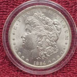 lot 36 image: 1884-O Morgan Silver Dollar in Airtite, Higher Grade