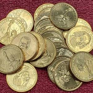 lot 76 image: 25 Presidential Dollars--Most Uncirculated