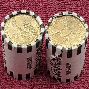lot 84 image: 2 Rolls Dollar Coins--Presidential & Sacagawea showing (50 Dollar Coins)