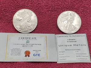 lot 86 image: 2-1 oz .999 Titanium Coins, 2021 & 2023