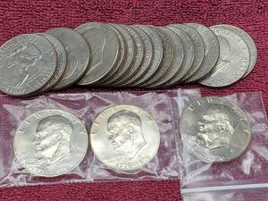 lot 88 image: 19 Eisenhower Dollars, includes 3 Proofs