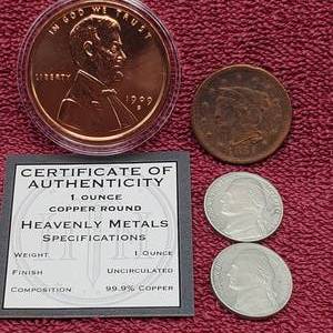 lot 107 image: 1851 Large Cent, (2) 2004-S Jefferson Nickels & 1 oz Copper Round