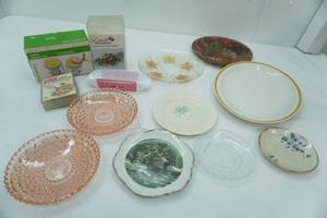 lot 21 image: Stoneware platter ,various pretty plates, Butter warmer, Hor doeuvres cutting tools, hot dog trays