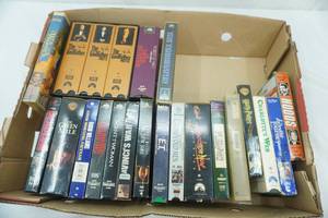 lot 35 image: VHS Lot (The Wizard of Oz & More) and Magnetic Artwork for RefrigeratorsDishwashers