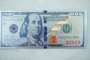 lot 47 image: Replica $100 Bill made of Gold Foil