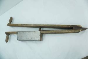 lot 48 image: Vintage Triumph band general store paper roll dispenser and cutter