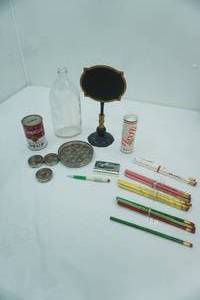 lot 54 image: Vintage Parsons Sudsy Ammonia Bottle, Campbells Soup Coin Bank, Maxfli Miracle Whip Golf Balls, Vintage Pencils, Vintage Glass and Metal Floral Trays