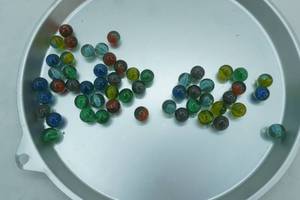 lot 56 image: Marbles .65lbs