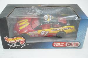 lot 80 image: Hot Wheels NASCAR Race Day Deluxe 124 scale diecast car. #97 Anthony Lazzaro
