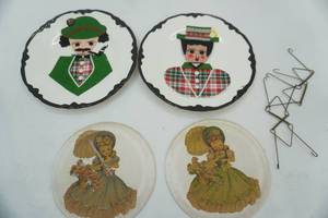 lot 115 image: Vintage Ceramic Decorative Plates Felt and Fabric Portraits (1950s1960s) Vintage 7 round cutout girl on plaster wall hangings