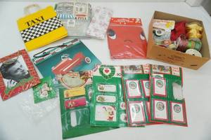 lot 124 image: Christmas Gift Bags, Ribbon, Labels, Tissue Paper, Inflatable Valentine Heart