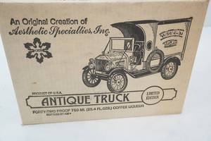 lot 145 image: Vintage Collectible Ford Truck Liquor Decanter. Ice Cream & Sarsaparilla Truck
