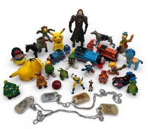 lot 24 image: Fun Toy Lot - Pokemon, The Simpsons, The Smurfs, Thomas The Tank Engine and More