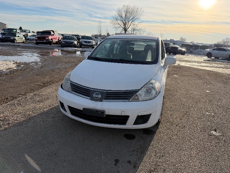lot 6 image: 2009 Nissan Versa only 110,840 miles
