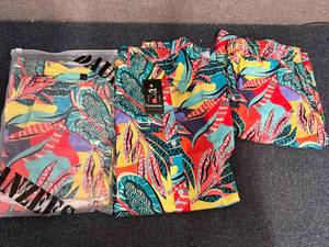 lot 54 image: 2 Sets Of Matching Shirts And Shorts - Xxl