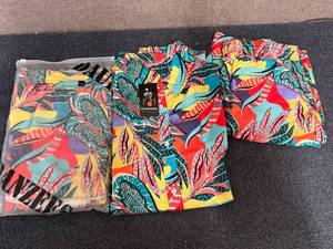 lot 56 image: 2 Sets Of Matching Shirts And Shorts - Xxl
