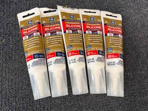 lot 74 image: 6 Tube Of Ge White Silicone