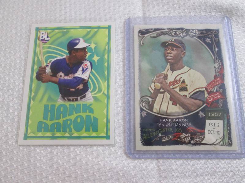 lot 102 image: Hank Aaron Cards...