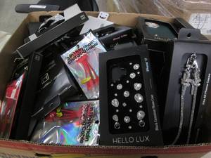 lot 580 image: Box of cell phone cases and accesso...