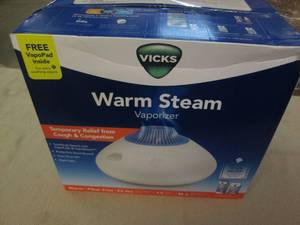 lot 592 image: Warm steam vaporizer...